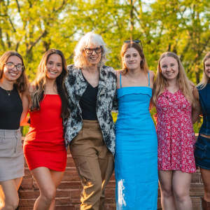 Christine Ussler standing with her Art, Architecture and Design students.