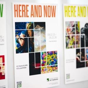 Three white posters with Here and Now across the top in green, orange, and yellow text. Images of artwork have graphic lines overtop to connect them.