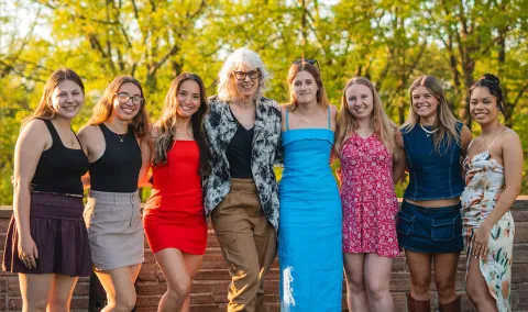 Christine Ussler standing with her Art, Architecture and Design students.