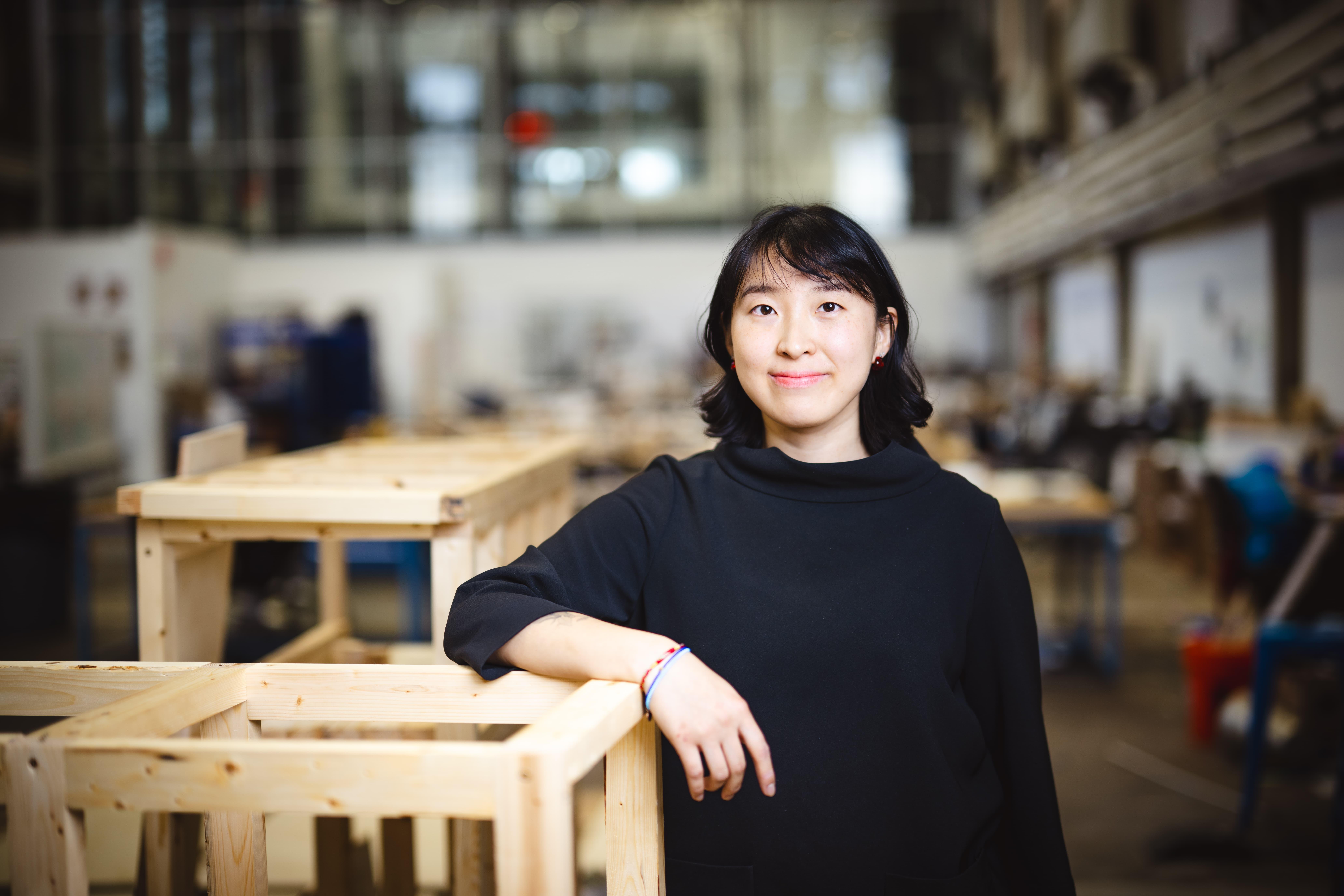 Christina Chi Zhang standing in her studio.