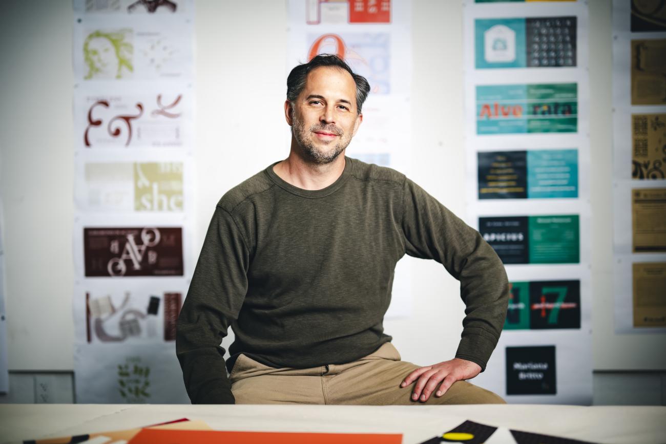 Kevin Lahoda sitting in his studio.