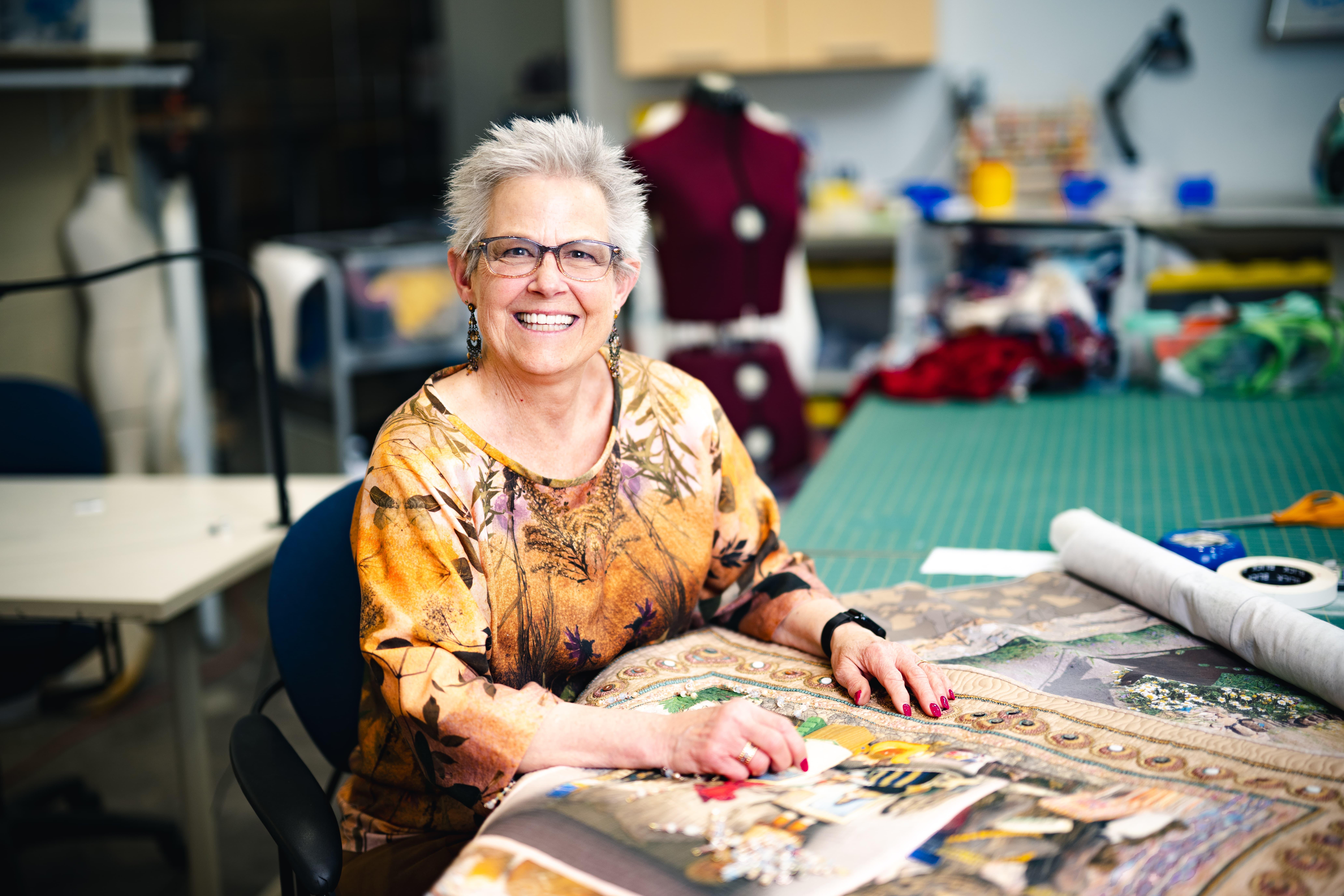 Anna Chupa working on a quilt.