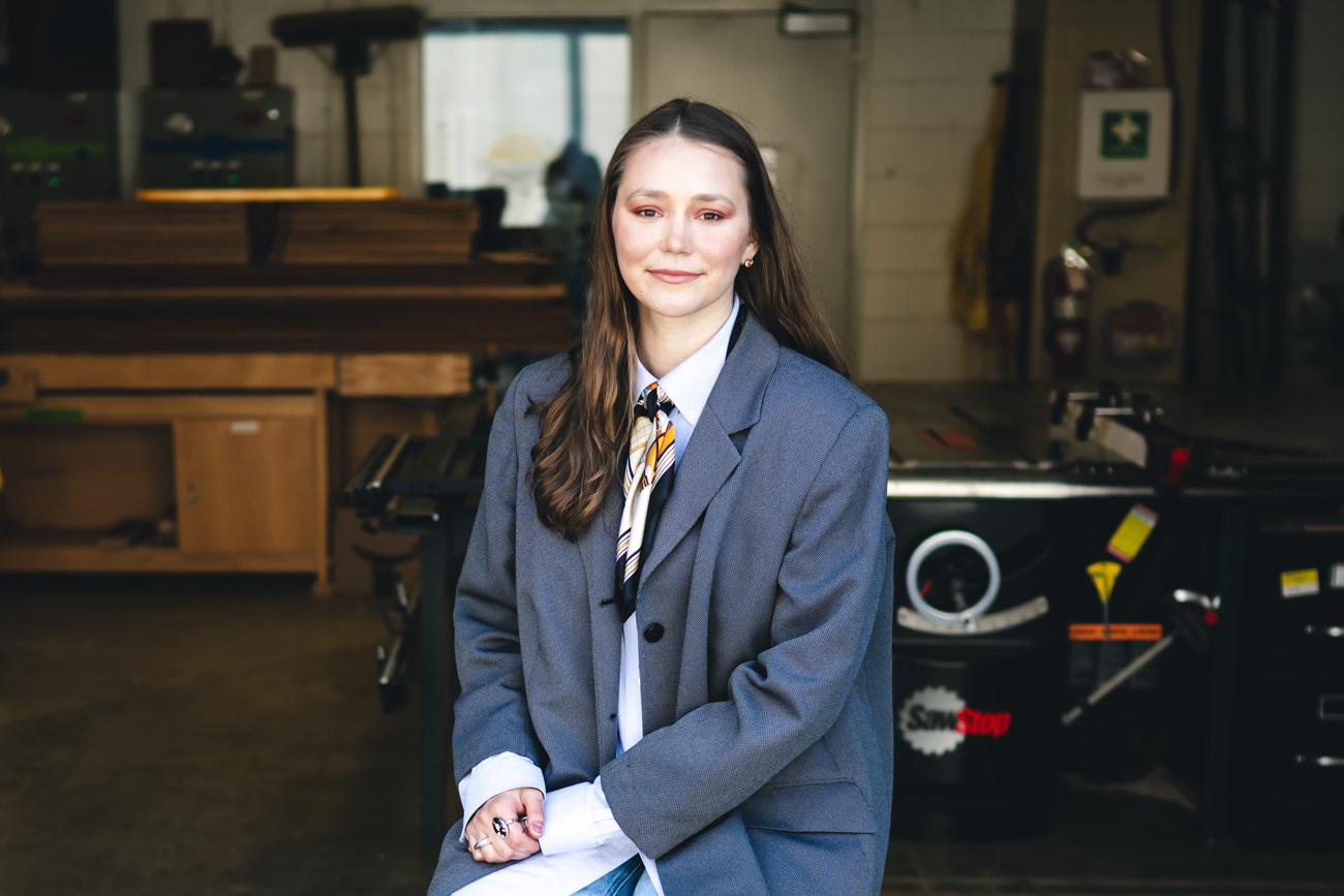 Mallory Kimmel sitting in her studio.