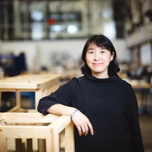 Christina Chi Zhang standing in her studio.