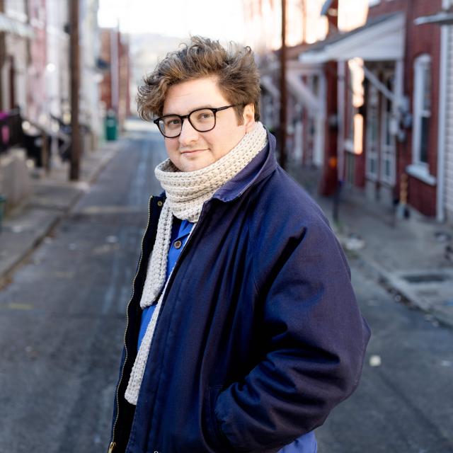 Wes Hiatt standing in an alley.