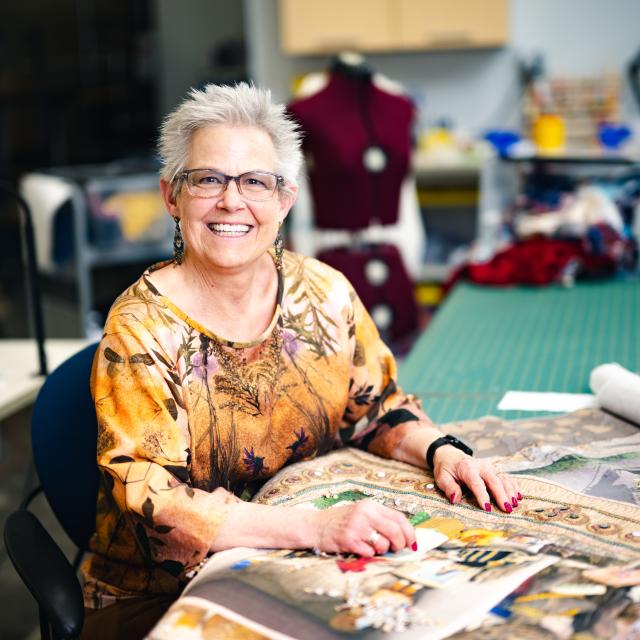 Anna Chupa working on a quilt.