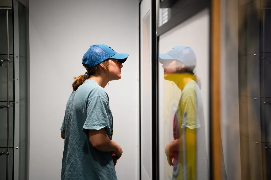 Student looking at a work of art in the gallery