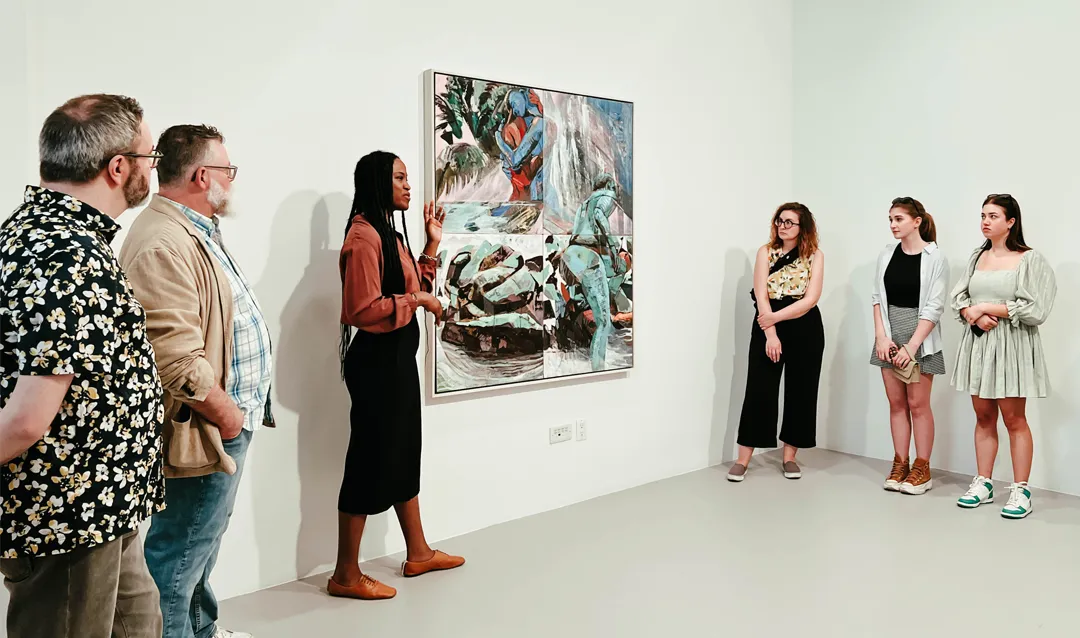 Gallery owner and director Nicola Vassell discusses artwork with Lehigh students in her gallery in Chelsea.